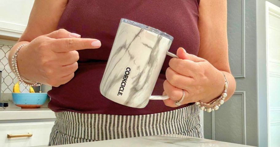 woman pointing to Corkcicle Coffee Mug