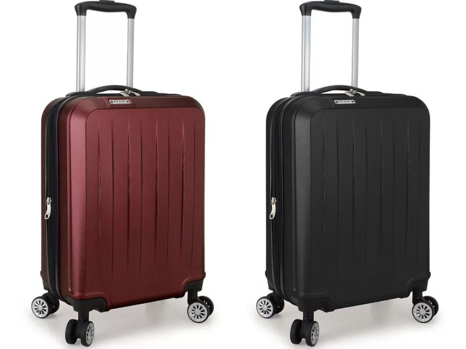 a burgundy and black hardside spinner carry on size luggage pieces with the handles up 