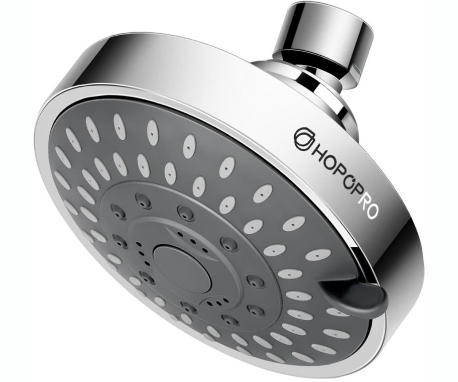 a 4 inch chrome shower head on a white background