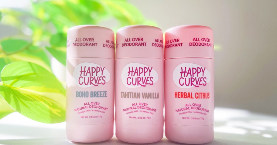 three pink sticks of Happy Curves Whole Body Deodorant