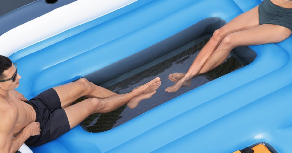 Foot soaking reservoir inside inflatable floating island