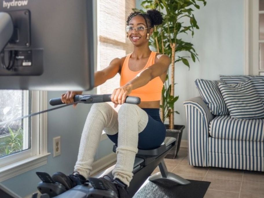 Woman using a Hydrow machine