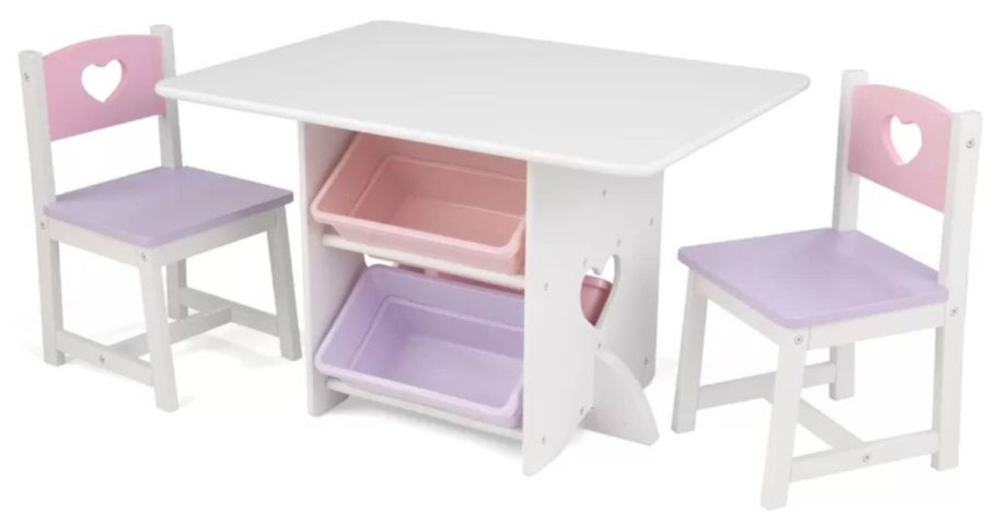 A kid's white and pink table and chair set