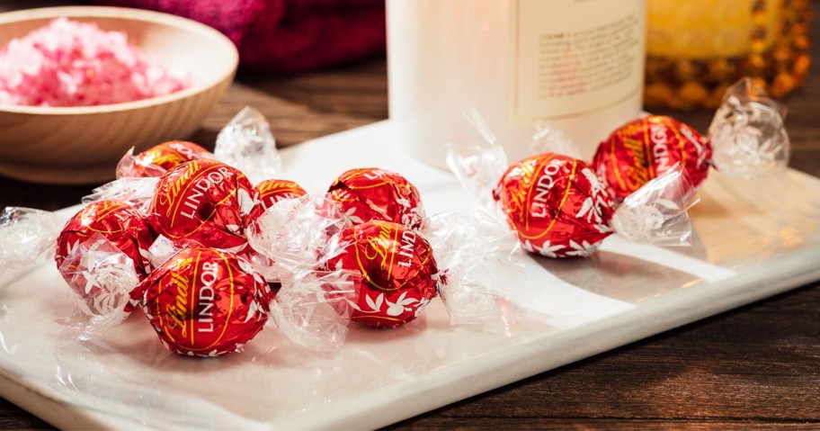 red Lindt Truffles on white plate