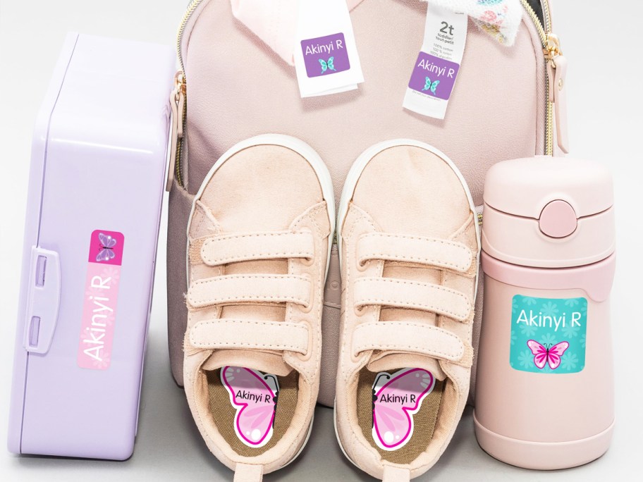 lunchbox, backpack, shoes, and water bottle with name labels