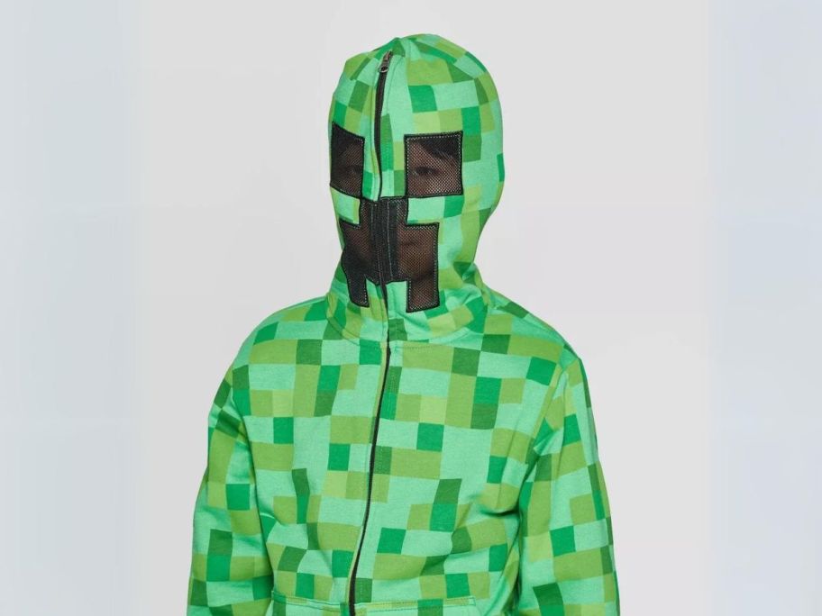 boy wearing Minecraft Kids' Creeper Costume Sweatshirt