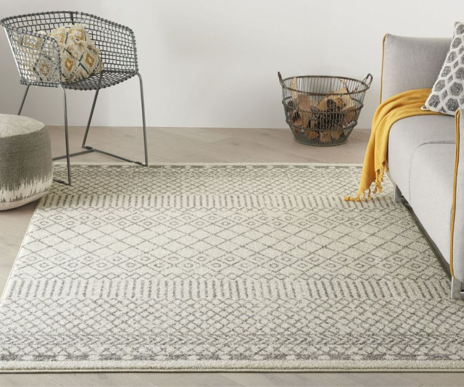 and ivory and gray rug on a sitting area