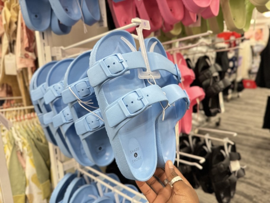 Shade & Shore Women's Neida EVA Two Band Slide Sandals in blue hanging in store