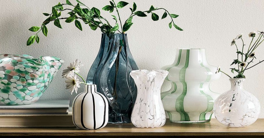 various glass vases on a table