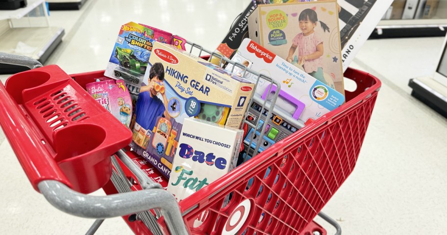 toys in a red target shopping cart