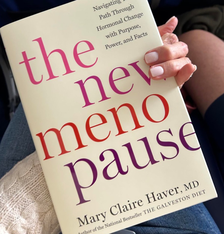 hand holding the new menopause book