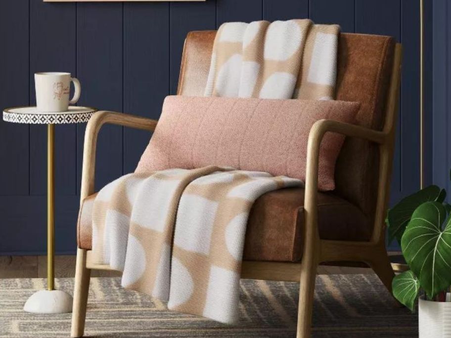 Threshold Reversible Knit Geo Throw Blanket on a chair