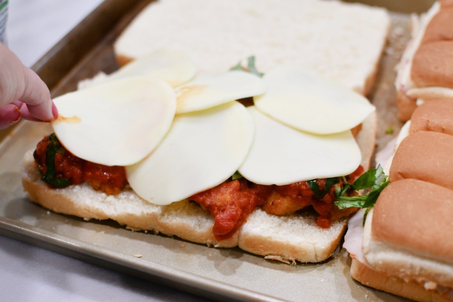 adding cheese to chicken parm sliders