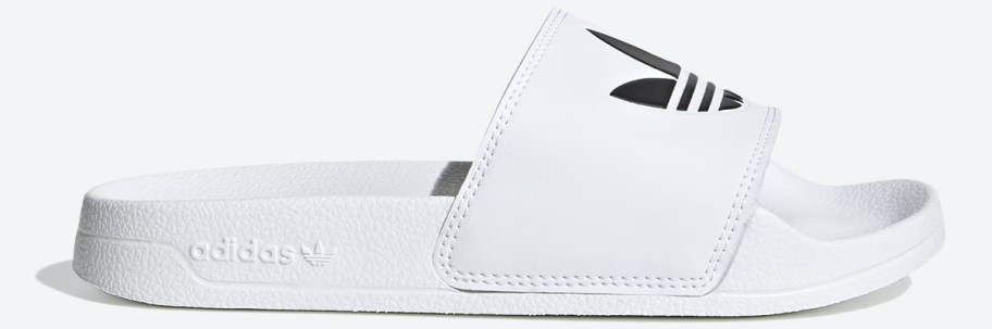 white slide with black adidas logo on top