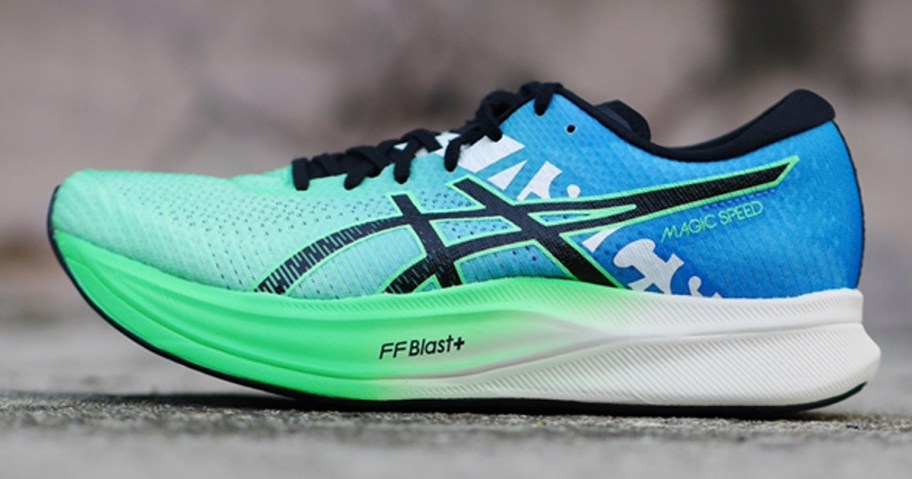 green and blue asics shoe 