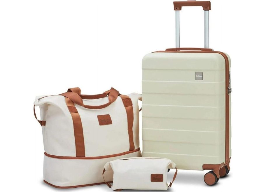 A 3-piece carry-on luggage set in white and tan