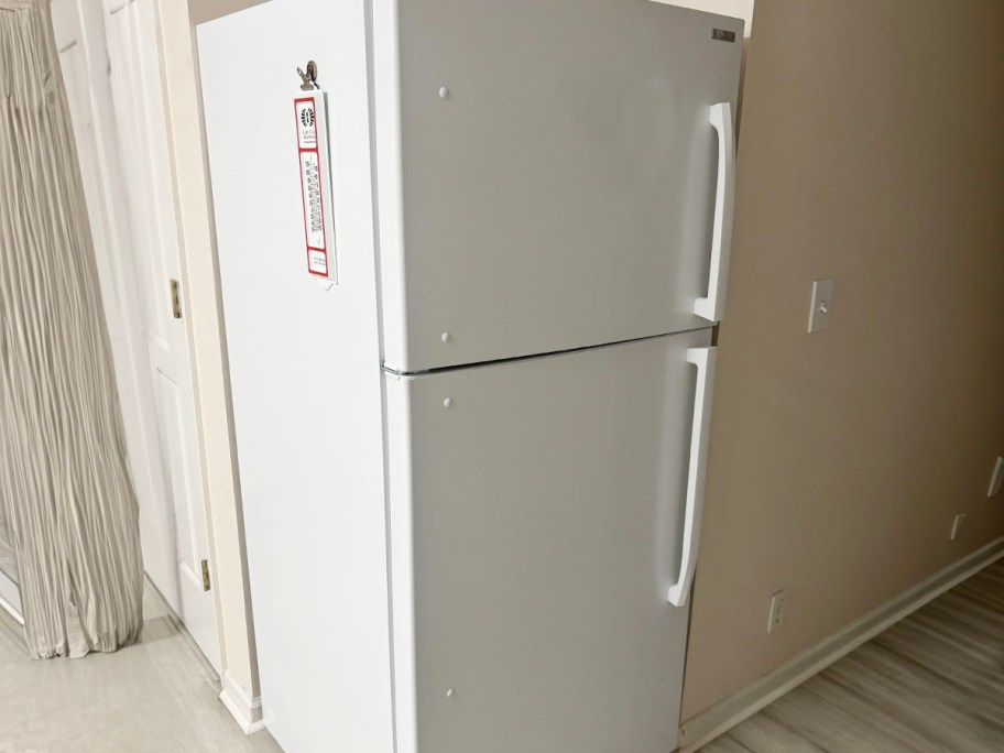 white refrigerator in kitchen 