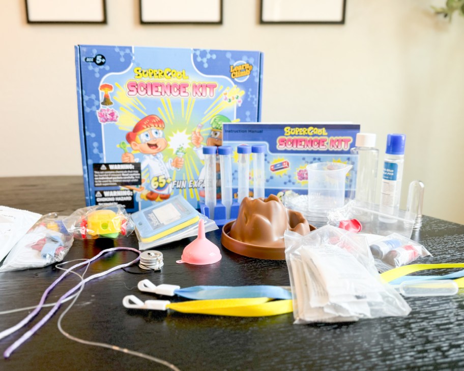 science kit with 56 pieces spread out on table