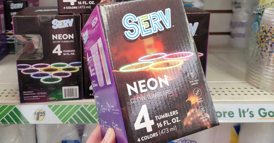 hand holding serv neon tumblers 4 pack box