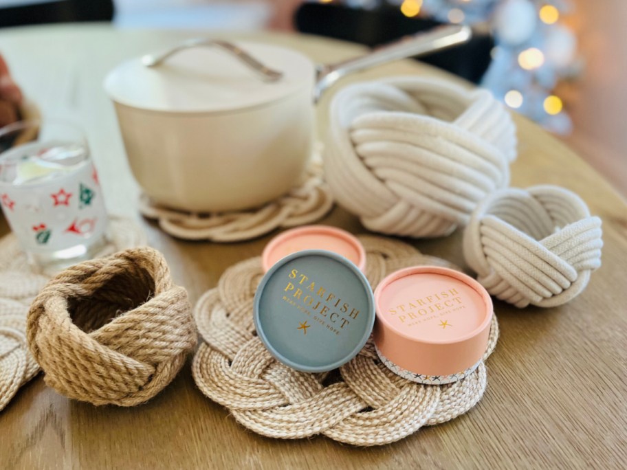 planters trivets and jewelry on table