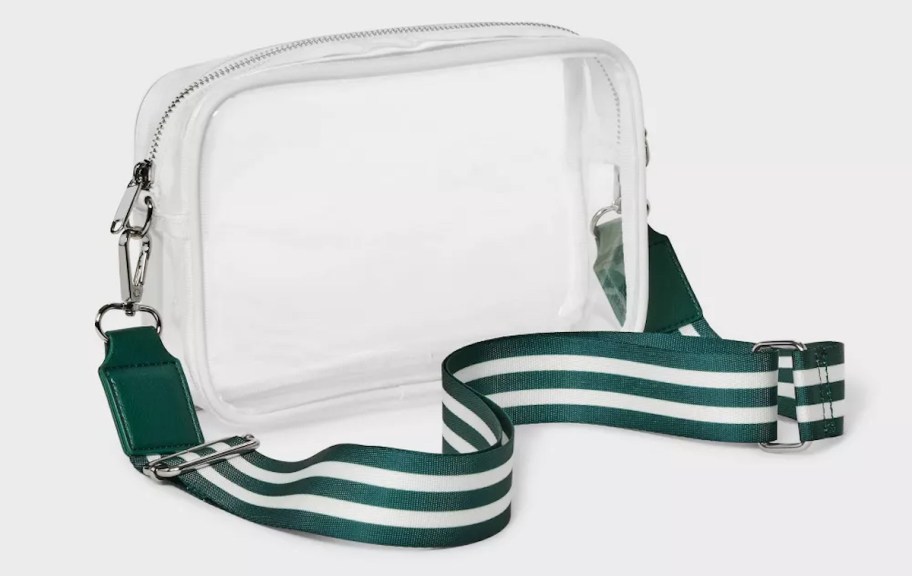 stock photo of clear crossbody bag with green stripe strap