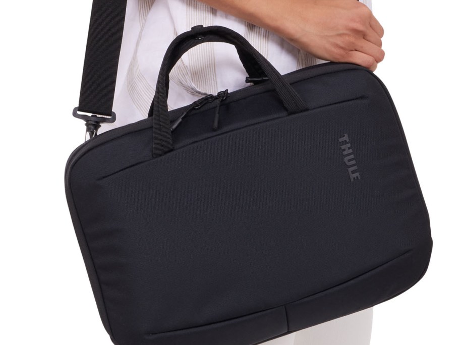 carrying a black messenger style laptop carrier