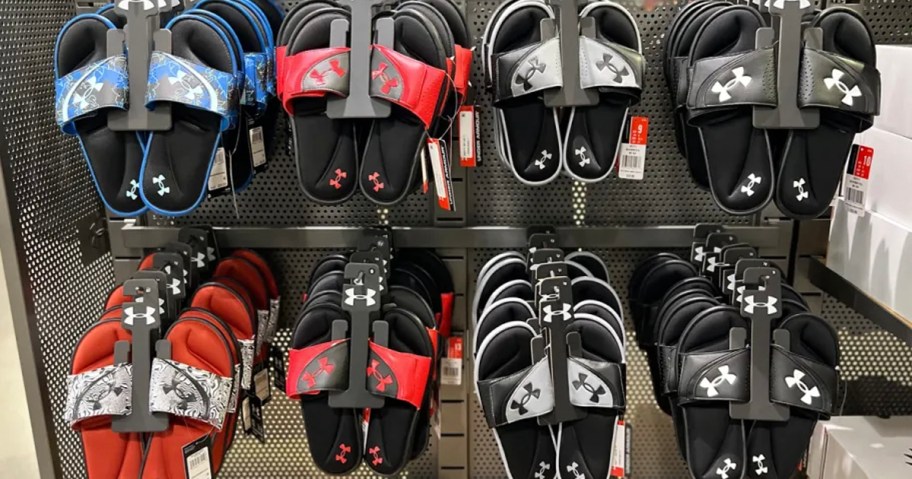 under armour slides hanging on display 