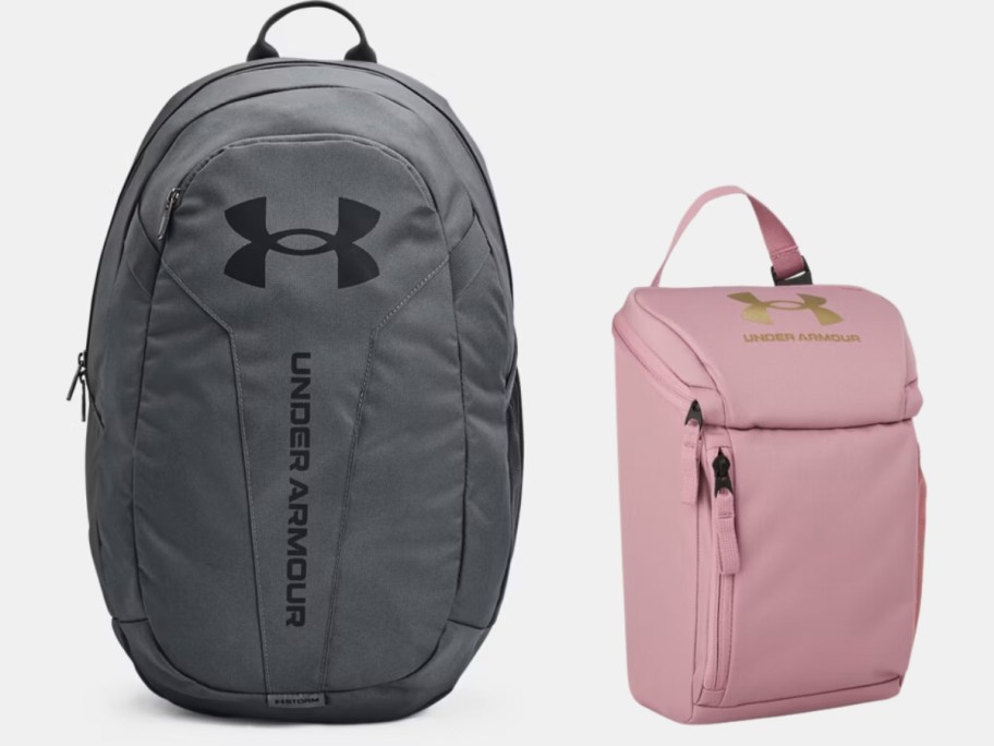 grey and black Under Armour backpack and pink and rose gold Under Armour lunch box