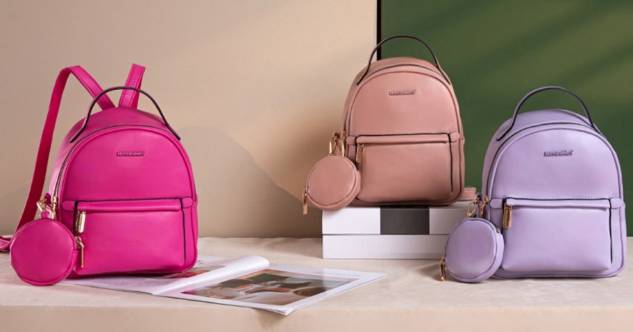 3 vegan leather mini backpack purses in hot pink, blush pink, and light purple 