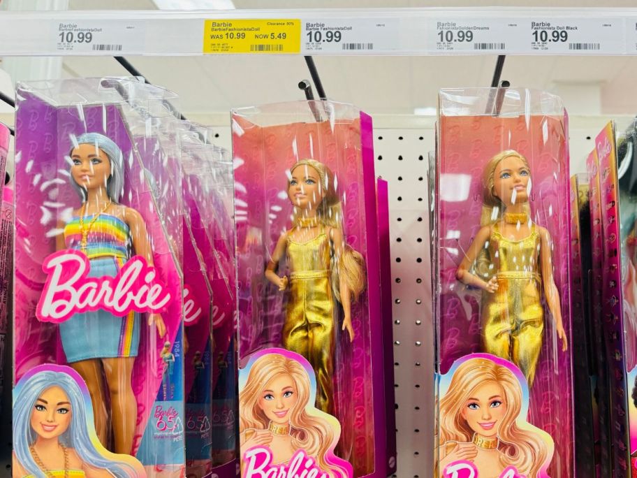 Barbies dressed in gold