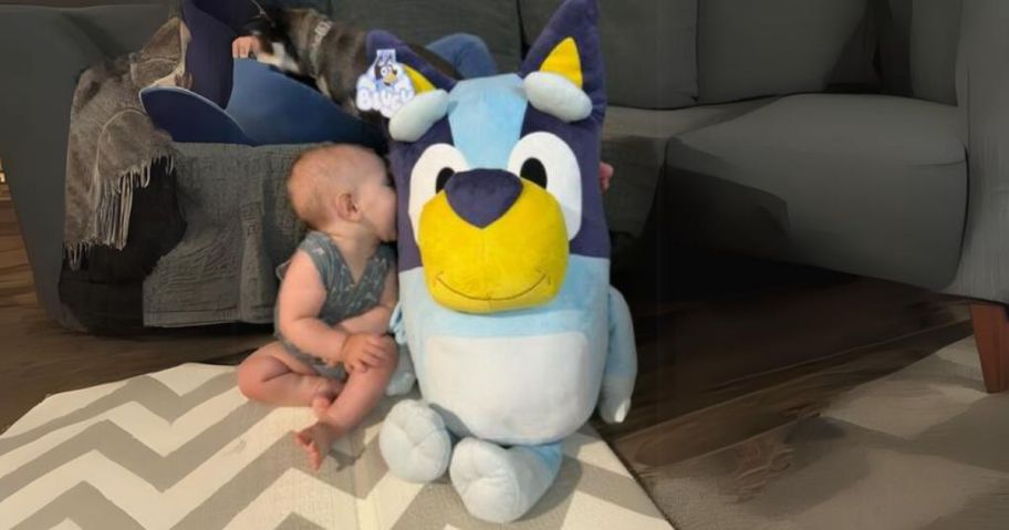 kid sitting next to Bluey My Size 36" Plush