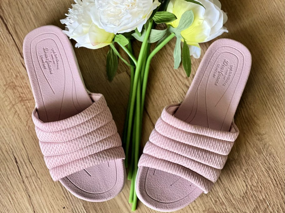 pair of pink Dearfoams slides 