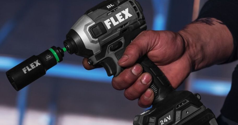 Hand holding a Flex Cordless Drill