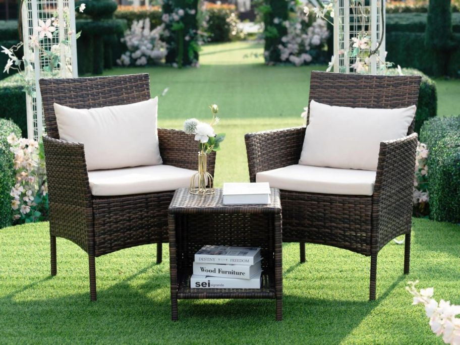 Grearden 3-Piece Wicker Patio Conversation Set w/ Off-White Cushions on lawn