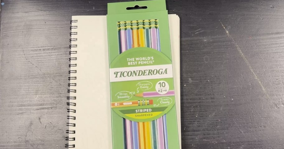 green box of Ticonderoga striped wood pencils on a notebook