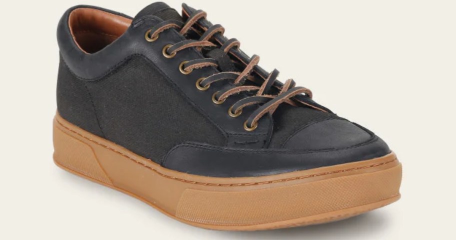 men's leather sneaker with a tan sole and black top