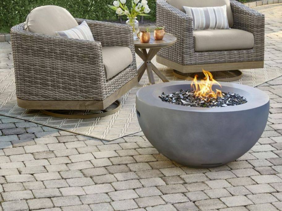 Hampton Bay Grove Park 36in x 18in Round Concrete Propane Gas Fire Pit on patio