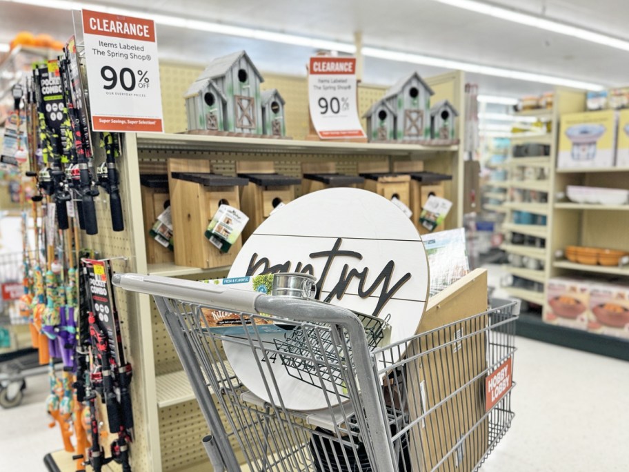 shopping cart full of clearance finds at hobby lobby store