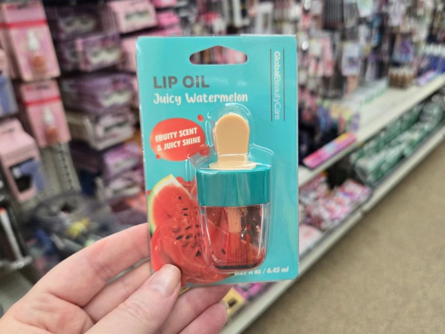 Juicy Watermelon Lip Oil in hand in store