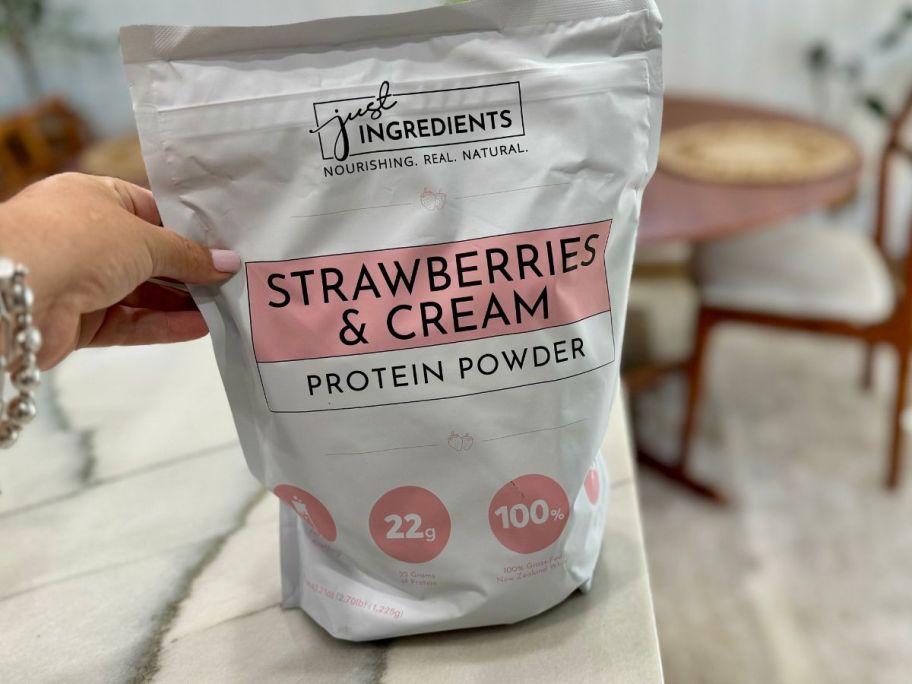 A bag of Just Ingredients Strawberries & Cream Protein Powder