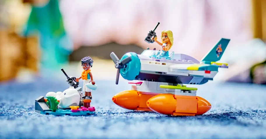 LEGO Friends Sea Rescue Plane set on blue rug