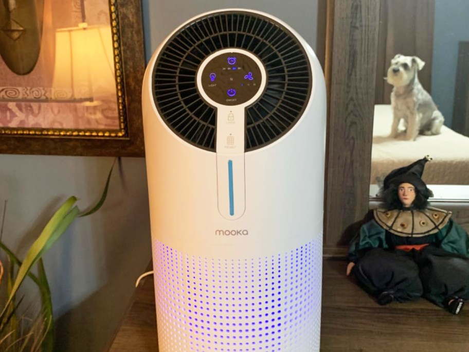 white and black air purifier on dresser