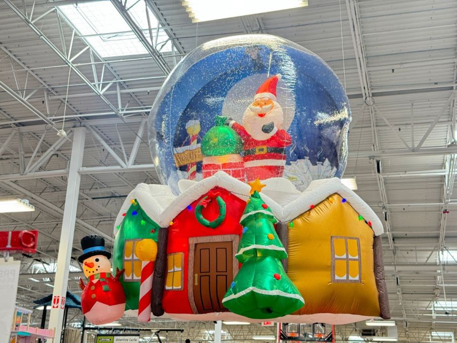 A Member's Mark 9' Pre-Lit Inflatable Snowglobe in the store