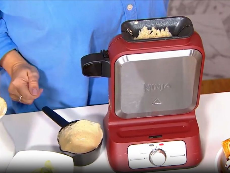 Ninja Vertical Nonstick Belgian Waffle Maker with waffle batter in it