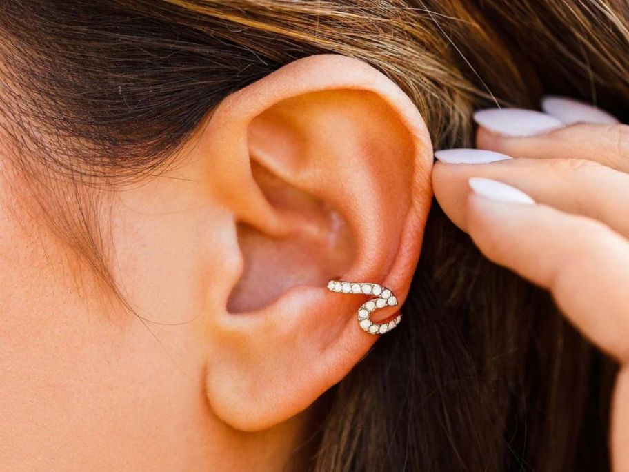 Pura Vida Rose Gold Stone Wave Ear Cuff on ear