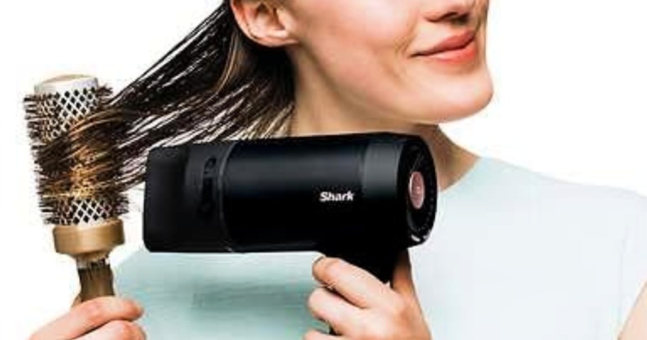 woman drying wet hair with Shark HyperAIR Blow Dryer