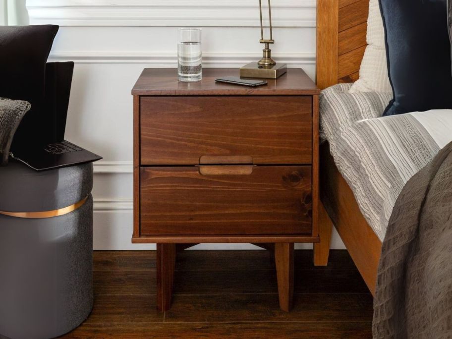 Sloane 2-Drawer Mid-Century Modern Nightstand next to bed