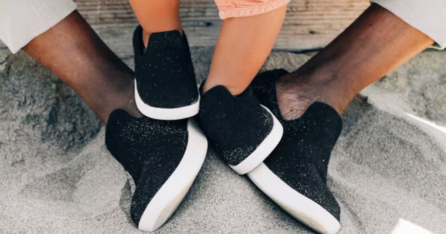 father and baby wearing matching shoes