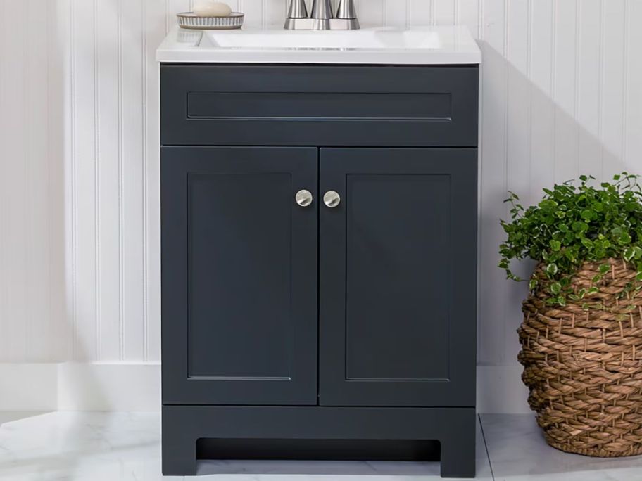 deep blue vanity with white marble top