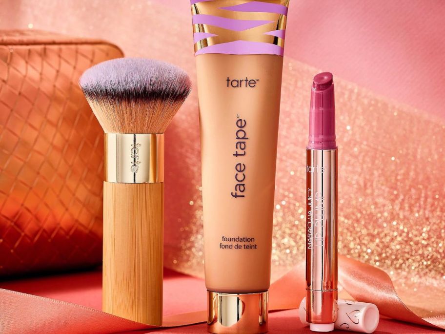 Tarte makeup bag, brush, supersize face tape foundation and maracuja juicy lip gloss